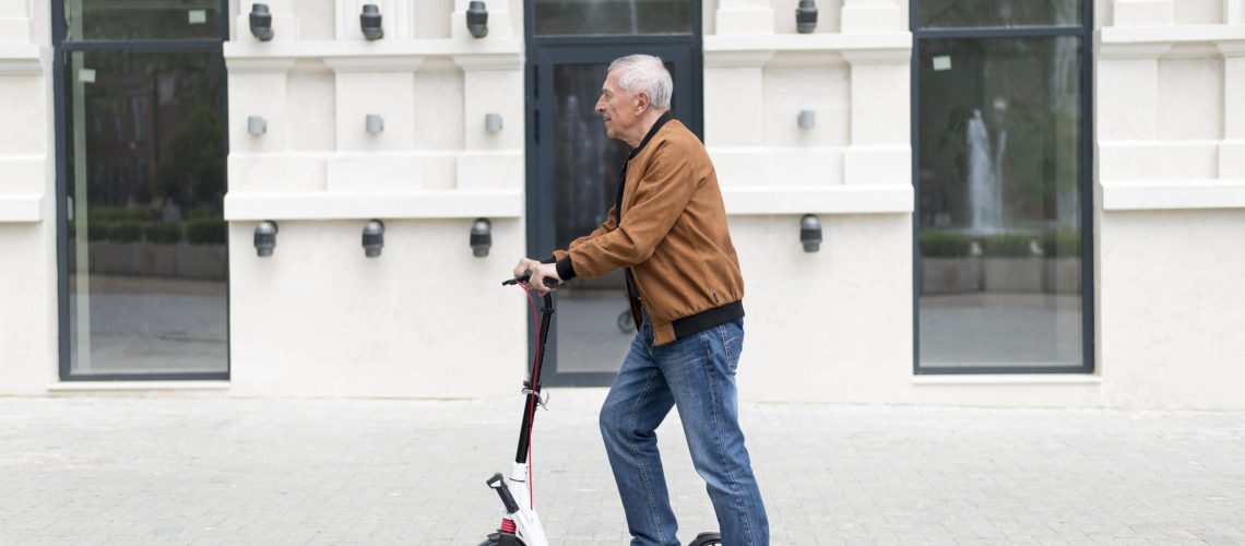 medium-shot-man-with-scooter