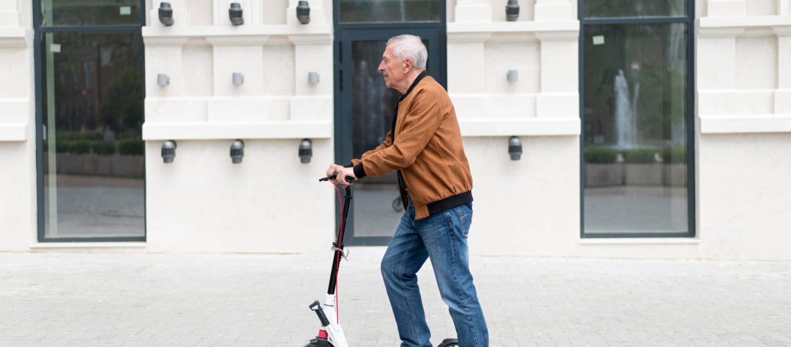medium-shot-man-with-scooter